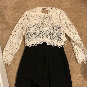 Black romper with white lace detail